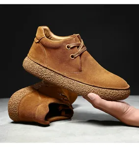 Detailed macro view of the premium suede leather upper and thick textured rubber sole