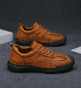 Close-up of brown leather casual shoes featuring handcrafted stitching and non-slip rubber soles