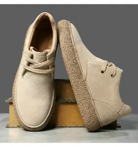 Detail of premium beige suede texture and thick textured rubber sole on casual men's shoes