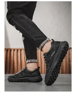Side view of men's casual black leather loafers with cross-stitch details and anti-slip sole