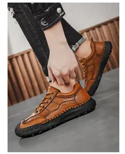 Close-up of brown leather casual shoes featuring manual stitching and anti-slip rubber sole
