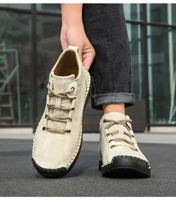 Close-up of handmade stitching and 100% rubber sole on outdoor casual leather boots