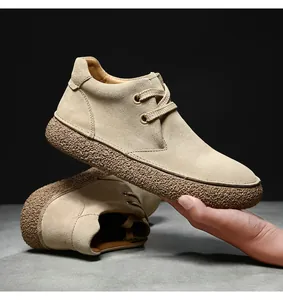 Macro view of khaki suede leather surface and durable non-slip thick rubber sole