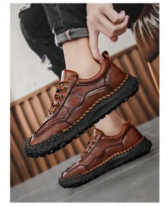 Detail of brown leather casual shoe showing handmade stitching and anti-slip rubber sole