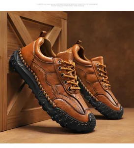 Detailed view of handmade brown leather loafer with outdoor rubber sole and stitching