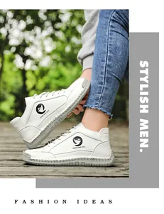 Détail de chaussures décontractées en cuir blanc pour hommes avec coutures et logo
