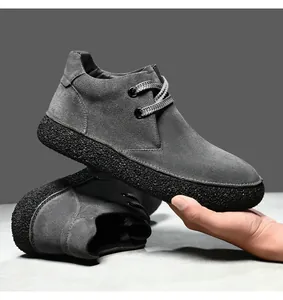 Close-up of dark grey suede mid-top shoes featuring premium matte leather and anti-slip thick soles