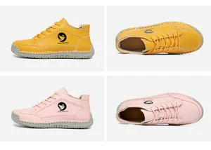 Détail de bottines jaunes et roses montrant la couture main et le logo oiseau gravé