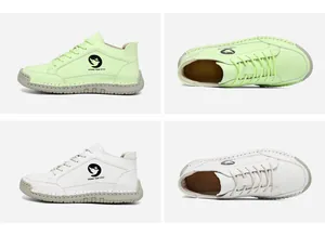 Détails des coutures à la main et du logo oiseau sur des bottines décontractées confortables