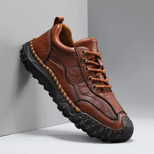 Brown outdoor casual men's leather shoes with durable rubber soles and stitching details