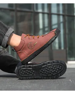 Outdoor male boots with non-slip rubber dot sole and casual high-top leather design