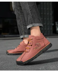 Macro detail of hand-stitched leather upper and slip-resistant rubber sole on men boots