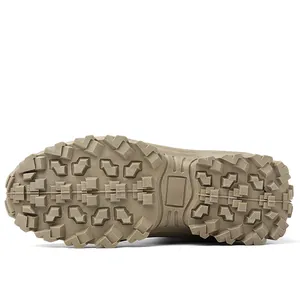 Detailed view of sand-colored tactical boot outsole with deep grip rubber treads