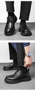 Detail of black glossy leather loafers with thick serrated rubber platform soles