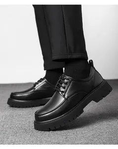 Detail of black platform leather shoes featuring non-slip rubber soles and matte finish