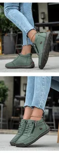 Detailansicht der grünen Nubukleder-Stiefeletten mit Reißverschluss und Gummisohle