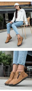 Details brauner Leder-Freizeitschuhe mit seitlichem Reißverschluss und Gummisohle
