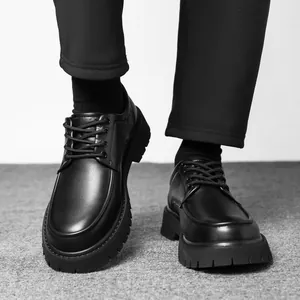 Men's black platform slip-on loafers with thick lug sole and high-quality leather finish