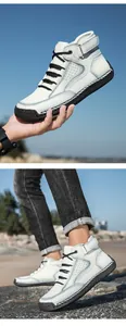 Detailansicht weißer hoher Leder-Freizeitschuhe mit Kontrastnähten und dicken Gummisohlen