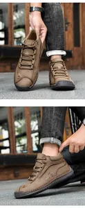 Detail view of brown leather casual shoes featuring 100% rubber sole and sport logo