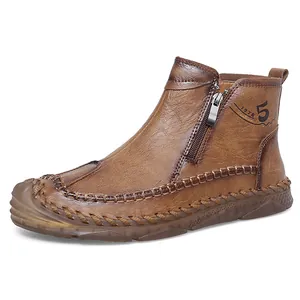 Stivali vintage in pelle marrone con cerniera laterale e cuciture a contrasto