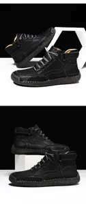 Detailaufnahme schwarzer Outdoor-Lederstiefel mit Kontrastnähten und Klettverschluss