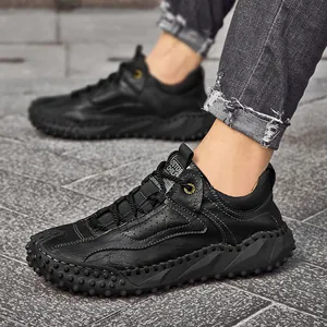 Chaussures décontractées pour hommes en cuir noir avec coutures blanches et semelles épaisses