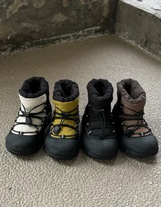 Waterproof children's winter boots in four colors with drawstring and anti-slip soles