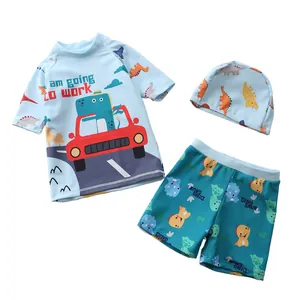 Maillot de bain trois pièces pour garçons avec motifs dinosaures, haut, short et bonnet
