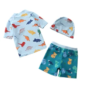Maillot de bain trois pièces dinosaure pour enfants avec haut à manches courtes et bonnet