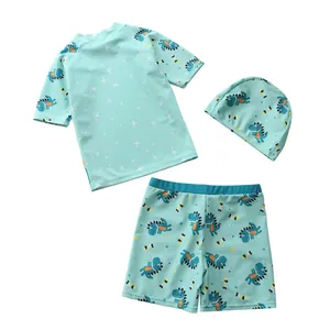 Ensemble de bain trois pièces pour garçons avec imprimé dinosaure et bonnet de bain