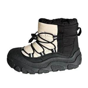 Waterproof winter snow boots for kids featuring non-slip rubber soles and warm quilted fabric
