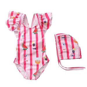 Detail of girls' striped swimsuit with watermelon prints and ruffled shoulder straps