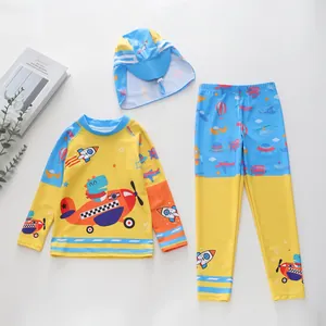 Vue détaillée de l'ensemble maillot de bain enfant à manches longues avec dinosaure