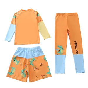 Costume da bagno 3 pezzi per bambini con stampe di coccodrilli e dettagli arancioni