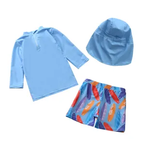 Ensemble de bain 3 pièces enfant avec haut à manches longues, chapeau et short imprimé