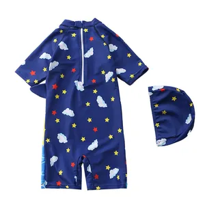 Detail of boys' blue long sleeve swimsuit with star pattern and back zipper closure