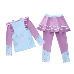 Dettagli del costume da bagno due pezzi bambina con maniche a balze e motivi unicorno