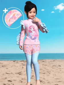Detail of pink long-sleeve kids swimsuit with mermaid print and blue ruffle cuffs