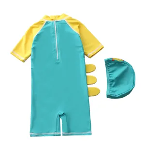 Detail view of kids one-piece swimsuit with dinosaur fins and back zipper closure