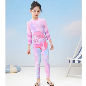 Detail of girls' long sleeve wetsuit swimsuit with mermaid print and gradient ocean pattern