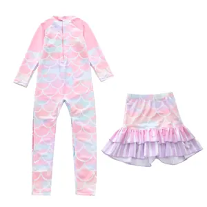 Detail of girls long-sleeve mermaid swimsuit with layered ruffle skirt and zipper guard