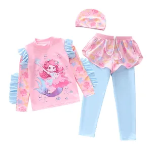 Detailed view of girls' three-piece swimwear set with mermaid print and sun protection
