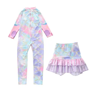 Detail of girls' mermaid long sleeve swimsuit with gradient fish scale print and ruffled skirt