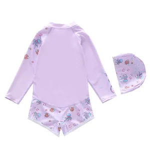Close-up of lilac long-sleeved kids swimsuit set with colorful cartoon marine prints