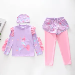 Three-piece long sleeve kids swimwear set with mermaid print and ruffle details