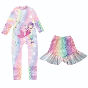 Detail of girls' mermaid swimsuit featuring long sleeves and fish scale ruffle skirt