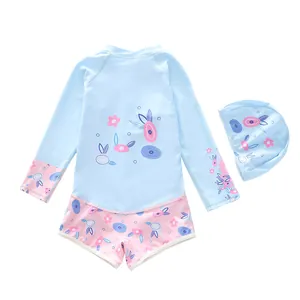 Kids long sleeve one-piece swimsuit with matching swim cap in light blue and pink floral