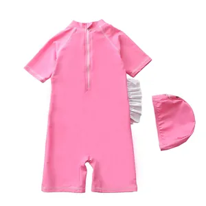 Maillot de bain rose pour fille avec volants blancs et bonnet de bain assorti pour enfants