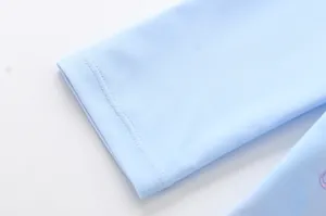 Close-up of light blue kids' swimwear with durable double-needle stitching detail